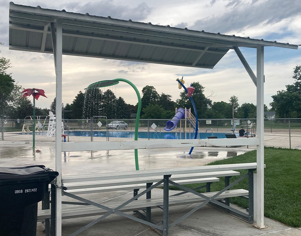 seating next to splash pad